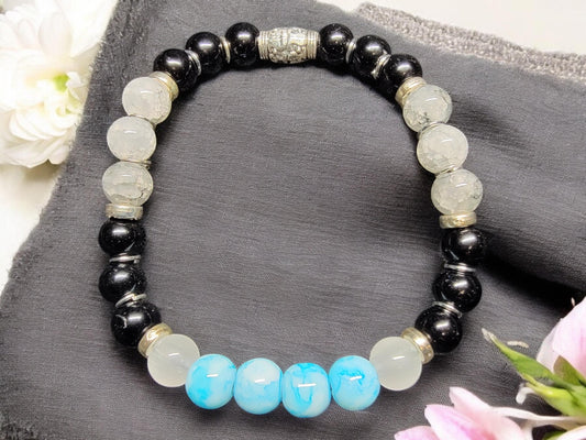 Hand crafted sky blue and black glass gemstone stretch bead bracelet. - LifeLoveInspired